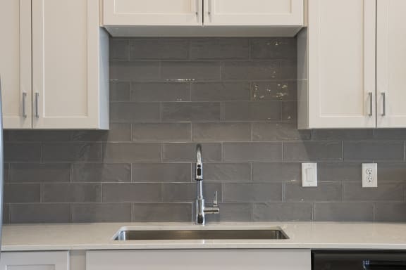 Gray tile backsplash