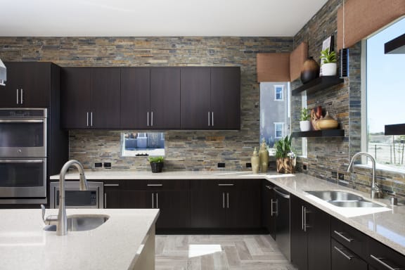 Moen fixtures in kitchens and baths