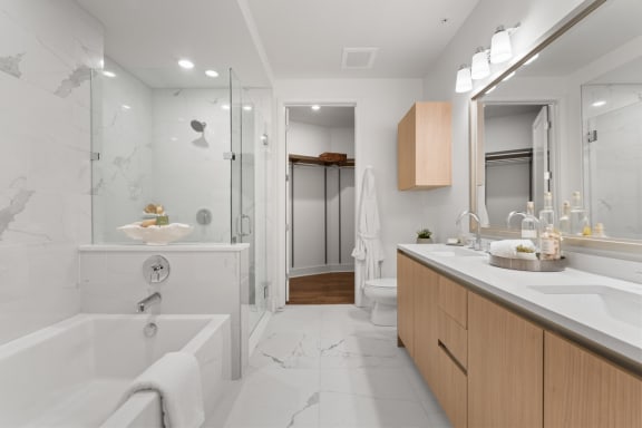 Double vanities, spacious showers and linen closets  at Stanza Little Italy, San Diego, 92101