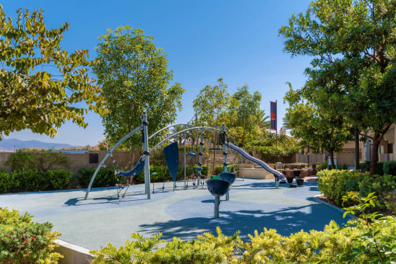 Playground with a swing set in a park at Tavera, Chula Vista, CA, 91913