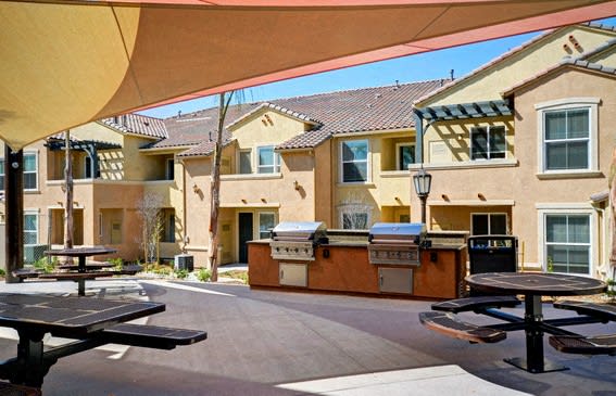 Outdoor seating area at RiverEdge Terrace* Apartments, San Diego, CA