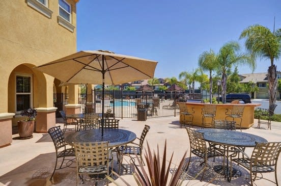 Outdoor seating at RiverEdge Terrace* Apartments, San Diego, CA, 92154