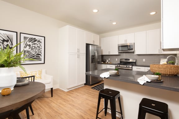 Quartz Countertops in open kitchen  at Sorano Apartments, 92557