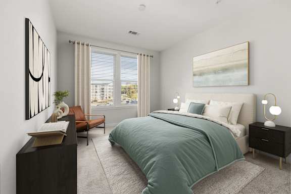 A bedroom with a large bed and a painting on the wall.