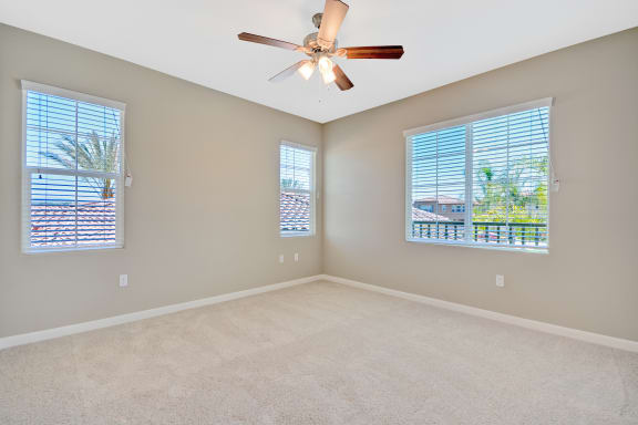 Wood Shutter Window Coverings in a living roomat Tavera, Chula Vista, CA, 91913