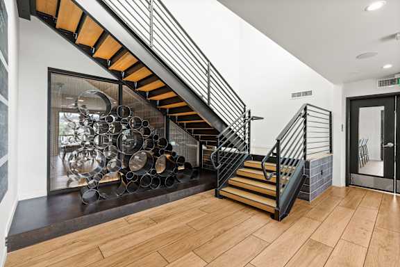 Staircase with Metal Railings at Axle, Seattle, WA