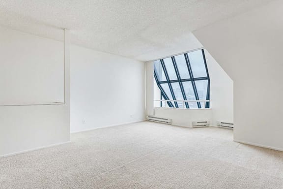 an empty room with a large window