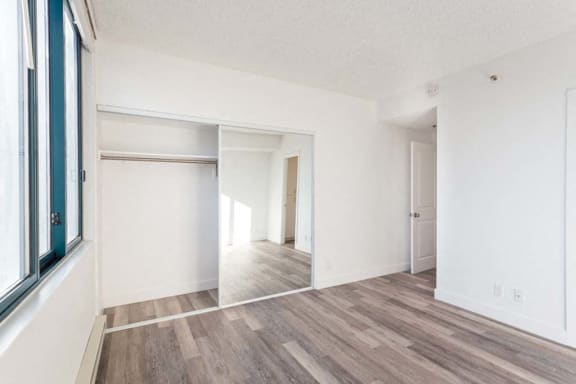 an empty room with a large window