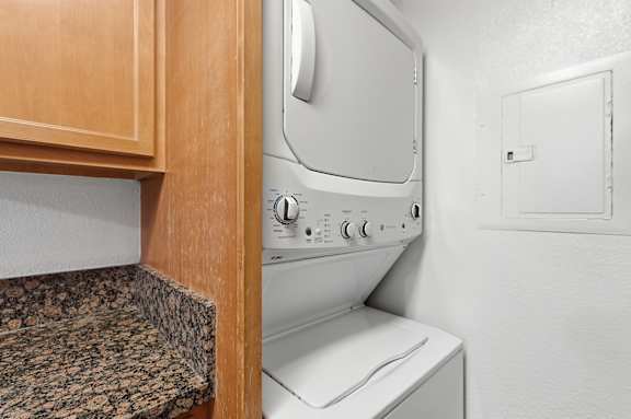 An in-unit stackable washer and dryer.