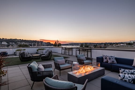 Equinox Rooftop Terrace with firepit at sunset  at Equinox Apartments, Seattle, Washington