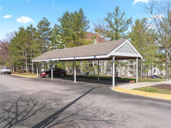 a covered parking lot with a carport