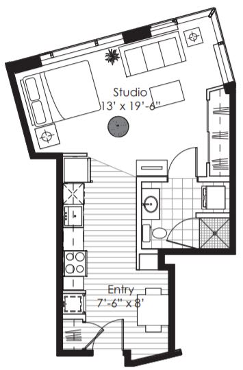 A floor plan of a studio apartment with a studio space, entry, and stairs.