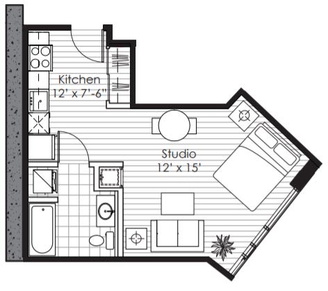 A black and white floor plan of a house with a kitchen and a studio.
