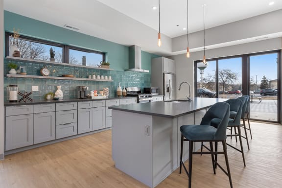 a kitchen with a large center island