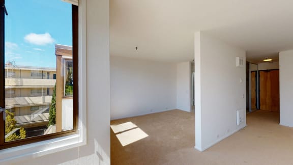 an empty room with a large window