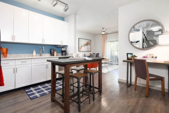 Kitchen with white cabinets at Solara, Sanford, FL