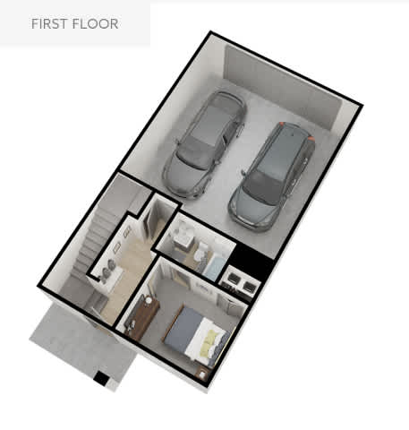 A first floor floor plan with two cars parked in the garage.