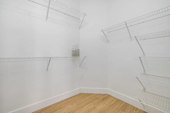 Empty white shelving unit in a room.