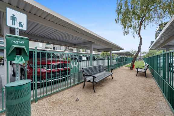 A parking lot with a sign that says
