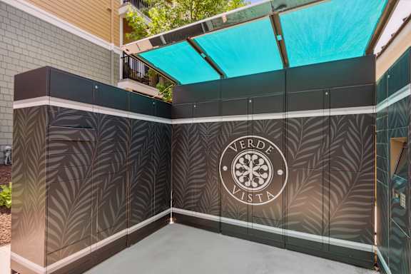 A Verde Vista logo is on a wall.