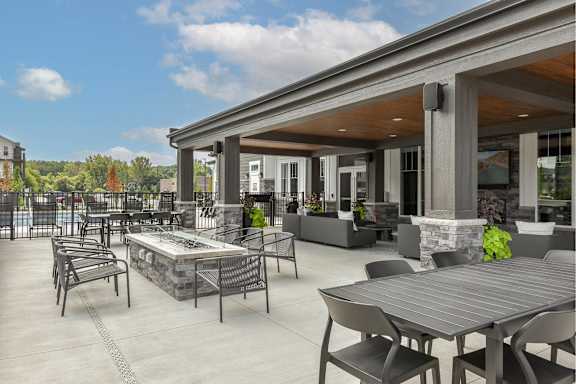 A patio with a table and chairs is shown.