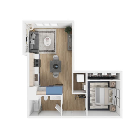 A small room with a bed, desk, and a refrigerator.