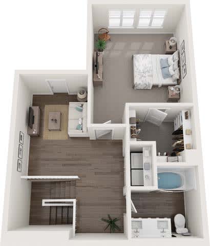 A small apartment with a bedroom, bathroom, and kitchen.