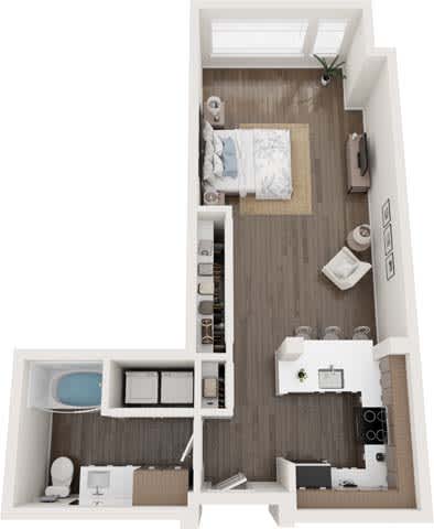 A small apartment with a bedroom, bathroom, and kitchen.