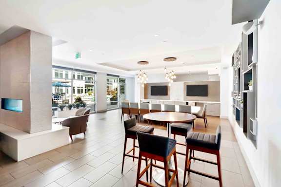 A modern dining area with a table set for four.
