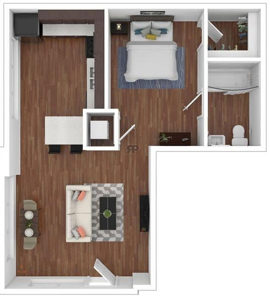 A small room with a bed, a couch, a table, and a chair.