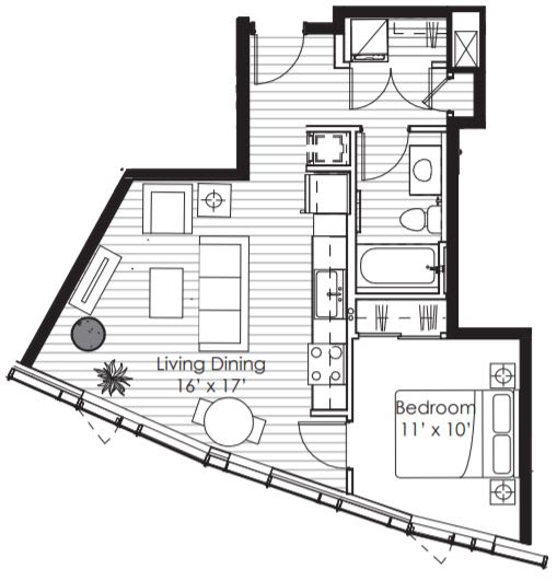 A floor plan of a small apartment with a living dining area and a bedroom.