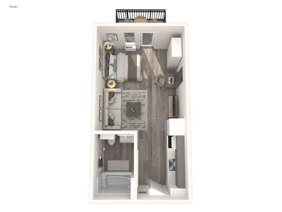 Floor Plan  A floor plan of a studio apartment with a bed, desk, and kitchenette.