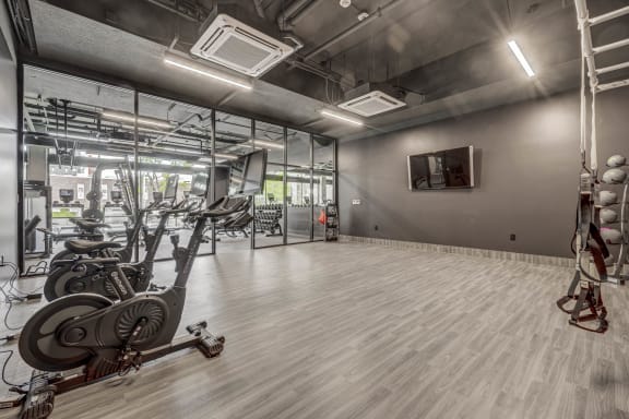 the gym at the flats at big tex apartments
