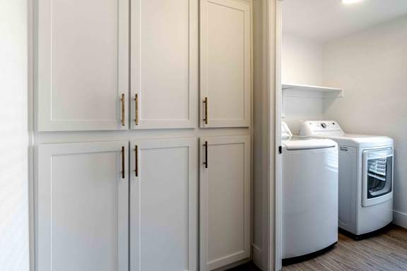 A laundry room with a washer and dryer.