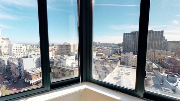 a large window with a view of a city
