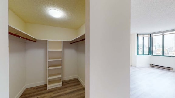 a bedroom with a ladder and a window
