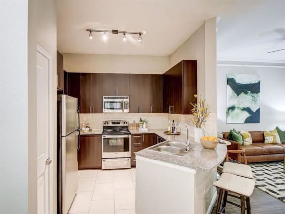 a kitchen with a sink and a counter top