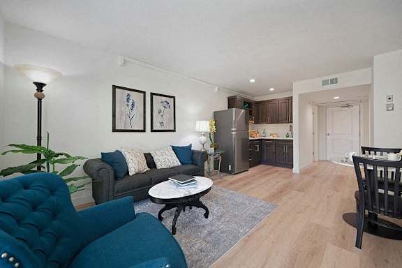 a living room with a couch and a table