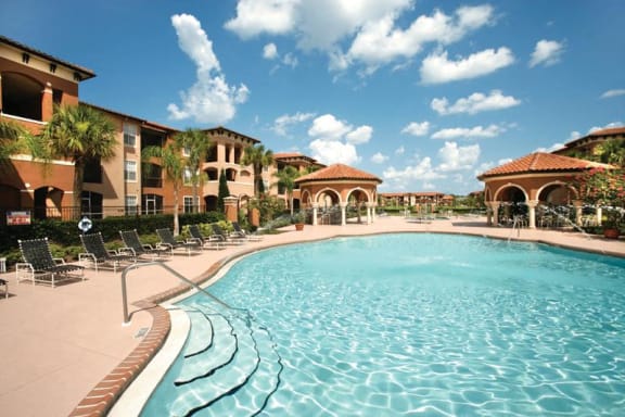Relaxing Pool Area With Sundeck at The Palms Club Orlando Apartments, Florida, 32811-2402