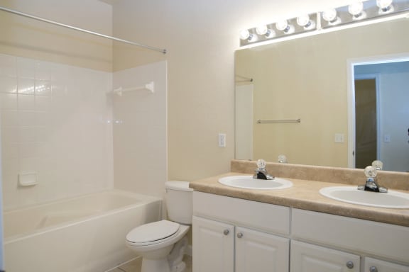 Interior Bathroom White Cabinets at Magnolia Place Apartment, Florida, 32606