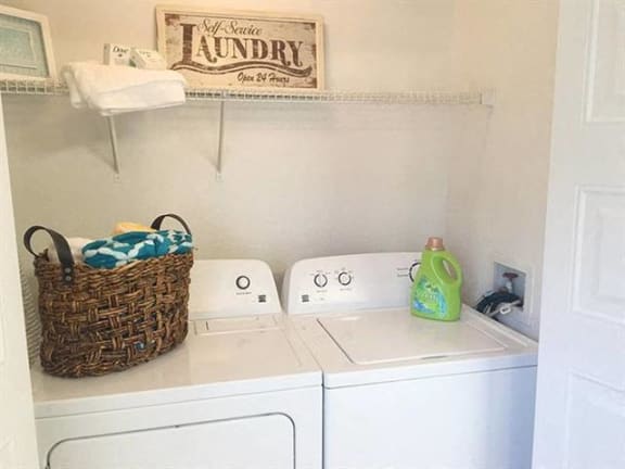 Interior View Of Washer and Dryer At Model Unit at Springwood Townhomes Apartments, Tallahassee, Florida