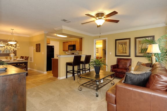 Living room with view of dining bar Aventine at Forest Lakes Oldsmar Tampa Florida