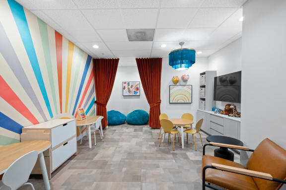 a waiting room with colorful curtains and chairs at Shoreham and Tides, Illinois, 60601
