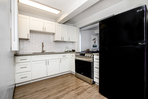 Kitchen cabinets at MALA GROVE Apartments, Waipahu, 96797