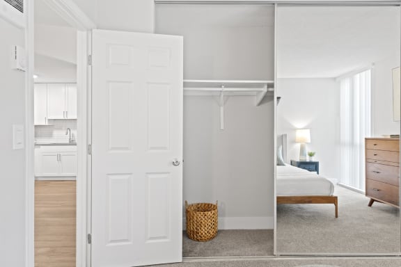 a bedroom with a closet and a white door at Veranda La Mesa, 91942