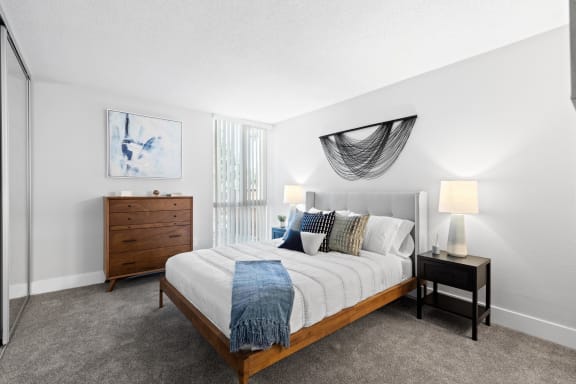 our apartments offer a spacious bedroom with a king sized bed at Veranda La Mesa, CA, 91942