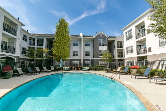 a swimming pool in front of an apartment building at Willowest in Lindbergh, Atlanta, 30318