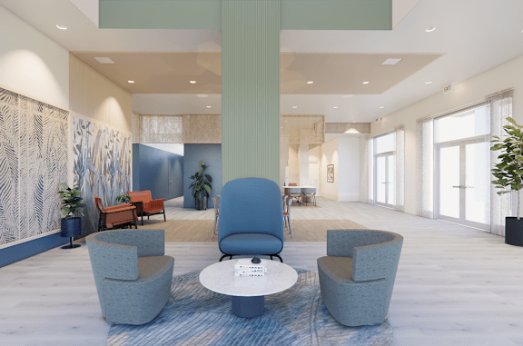 A modern waiting room with blue chairs and a patterned wallpaper.