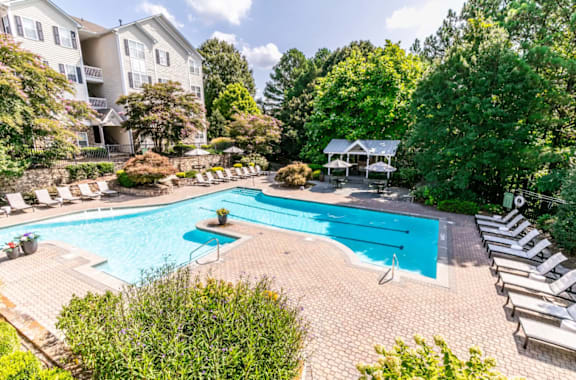Pool With Relaxing Chairs at Willowest in Vinings, Georgia, 30339