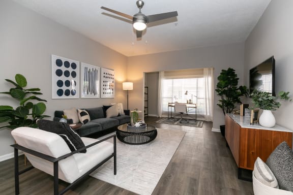 an open living room with a ceiling fan and at Willowest in Collier Hills, Atlanta, GA